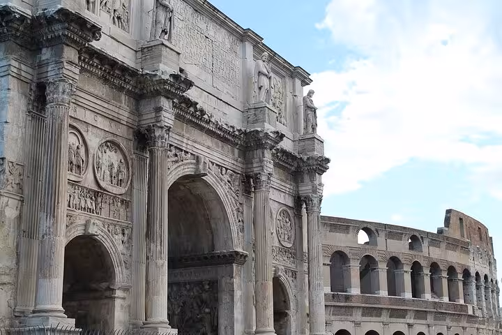 Close-up of the Colosseum's intricate architecture, highlighting its grandeur for an express tour of ancient Rome.