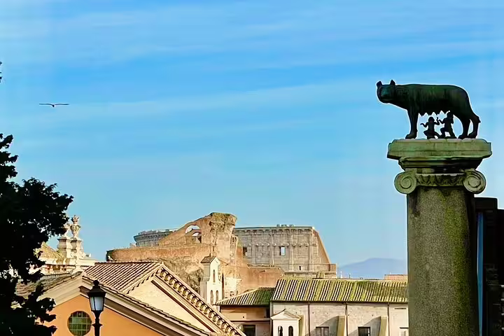 View of the Colosseum from Capitoline Hill with the she-wolf statue, Rome cityscape and fast track tour landmark