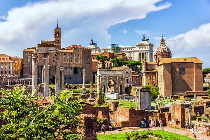 Panoramic view of the Roman Forum ruins and Palatine Hill seen on a Colosseum official guided tour in Rome, Italy