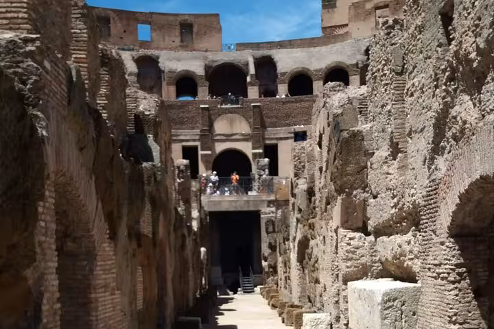 Experience the grandeur of the Colosseum's underground tunnels and arena floor on a private VIP tour in Rome.