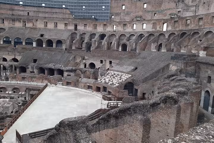 Experience the hidden depths of the Colosseum with a guided underground tour, revealing its iconic ancient structure.