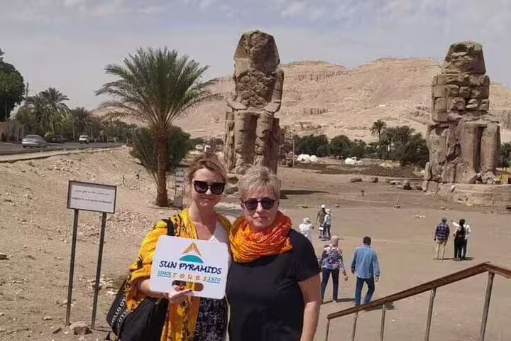 Tourists at Colossi of Memnon, West Bank Luxor on private Safaga Port day trip to royal tombs