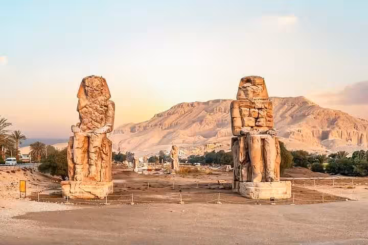 Colossi of Memnon in Luxor at sunset, visited on Sharm El Sheikh to Luxor day trip by plane