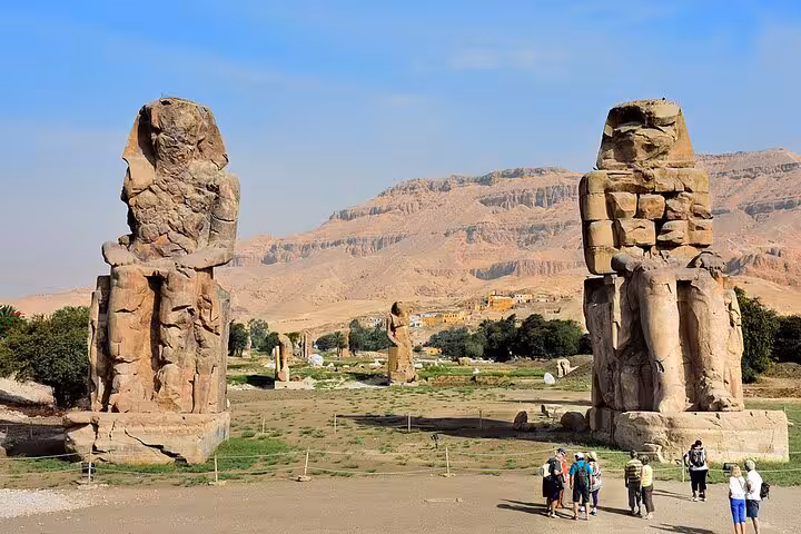 Colossi of Memnon statues on a full-day Luxor tour, West Bank stop before Valley of the Kings tombs