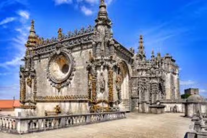 Discover the stunning Convent of Christ in Tomar, featuring ornate Gothic details on the Templars Route tour.