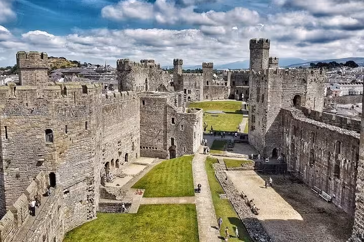 Inside Conwy Castle courtyard and towers, medieval fortress visit on Snowdonia & The 3 Castles Tour