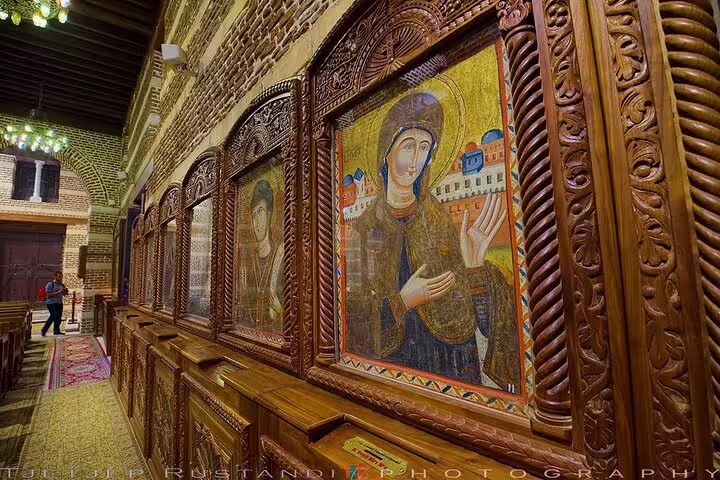 Carved wooden iconostasis with Virgin Mary icon in Coptic Cairo church on private tour and Nile felucca ride