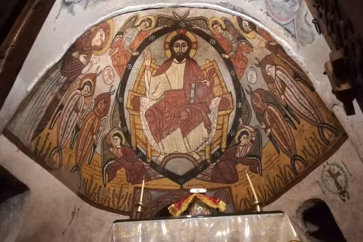 Ancient Coptic fresco of Christ enthroned with angels in apse of Red Sea monastery church