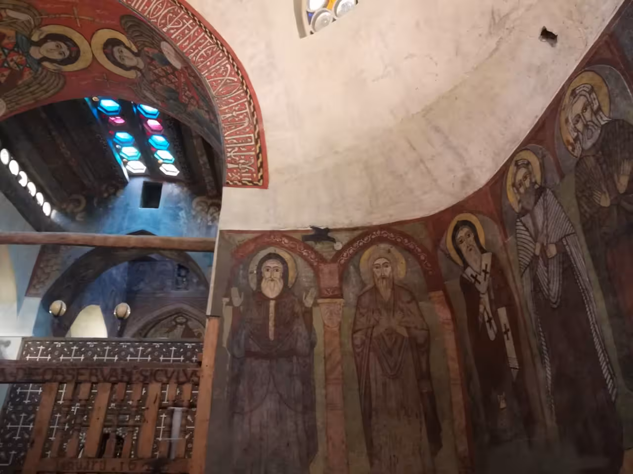 Ancient Coptic frescoes of saints on curved walls inside a Red Sea monastery near Sokhna