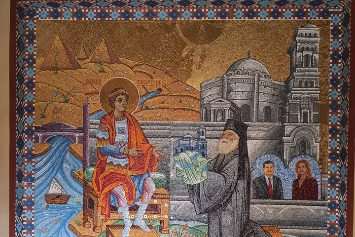 Coptic mosaic mural depicting saint and Old Cairo landmarks, cultural highlight on Cairo day tour itinerary
