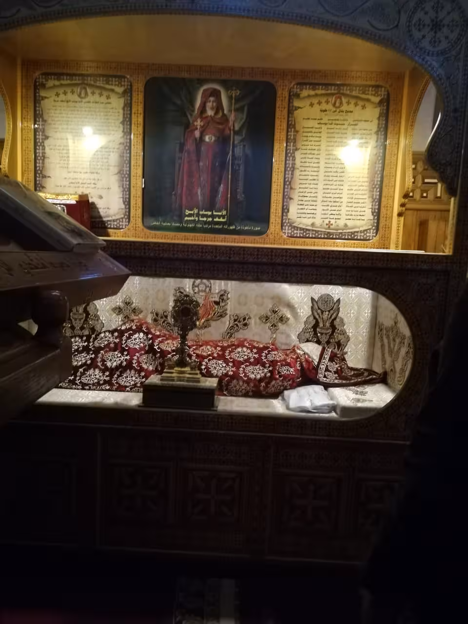 Ornate reliquary shrine with Coptic saint icon and Arabic inscriptions at Red Sea monastery