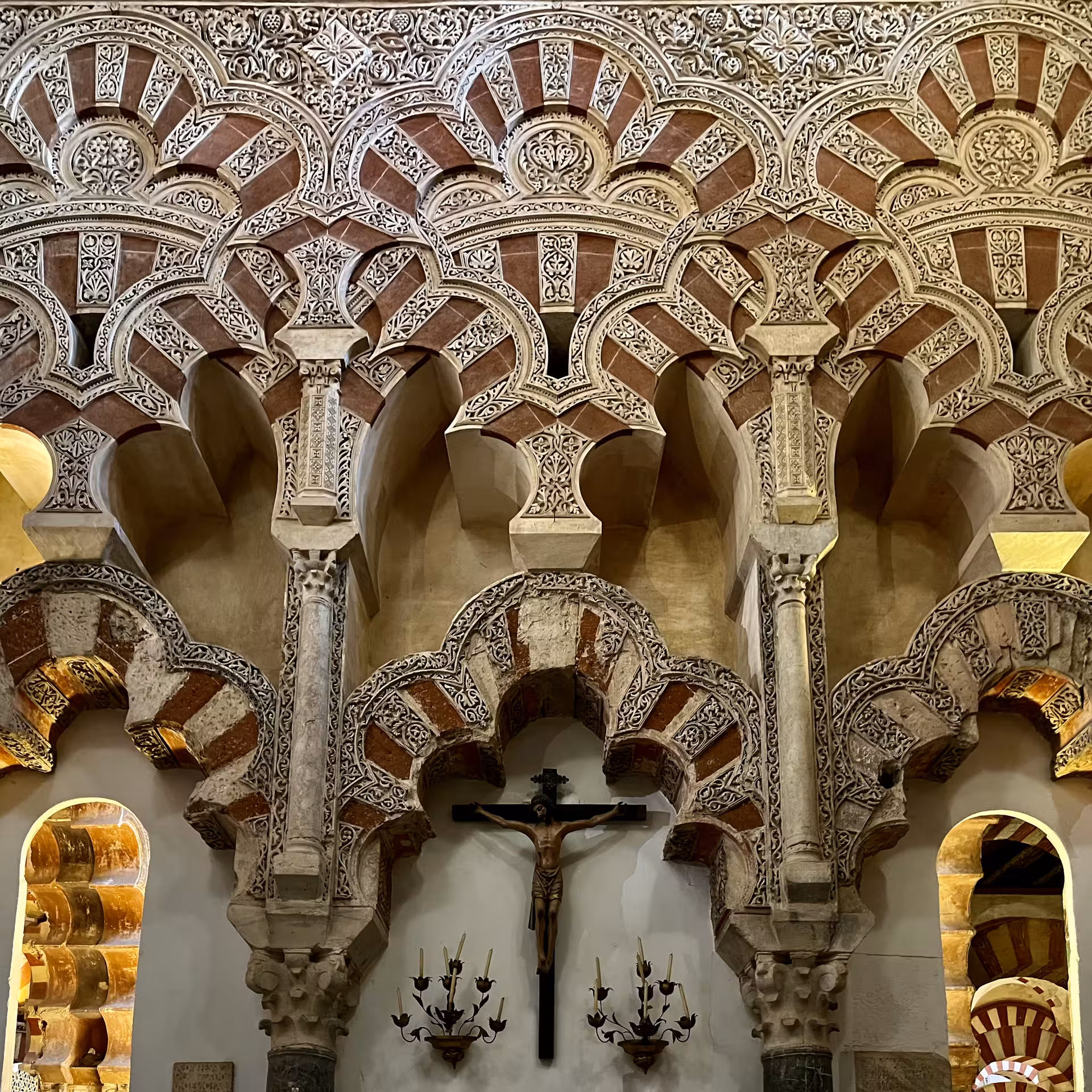 Intricate Moorish arches and carved stucco inside Córdoba Mezquita-Catedral, highlight of guided tour