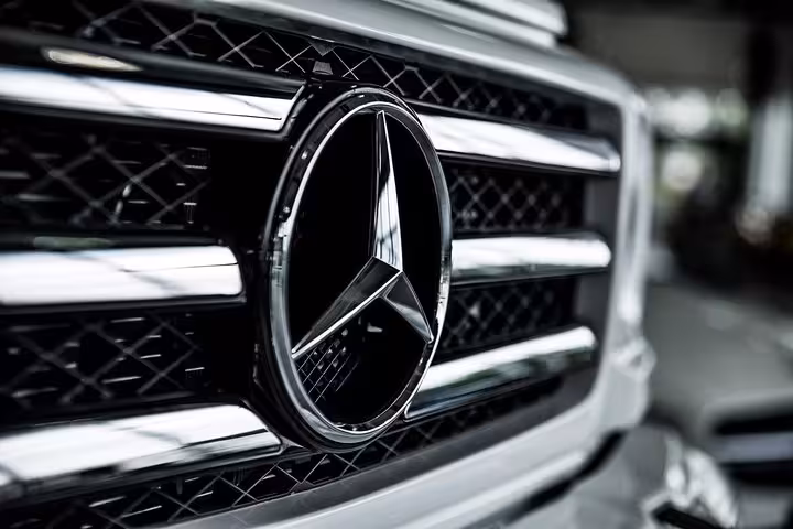Luxury private transfer vehicle grille for Corfu Airport arrival pickup, premium chauffeur service to hotel