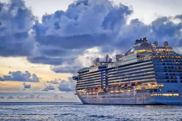 Cruise ship at Corfu port at sunset, ideal stop on Corfu in a Day private tour with scenic sea views