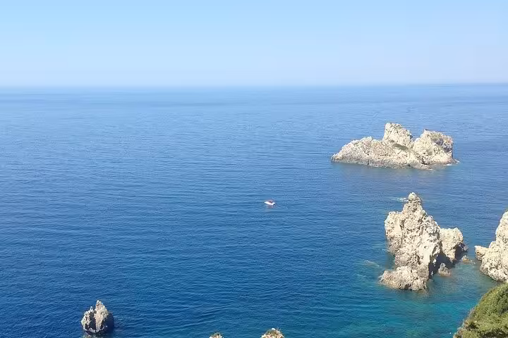 Ionian Sea cliffs and rock islets in Corfu, scenic stop on Corfu Beauty & the Beach private tour
