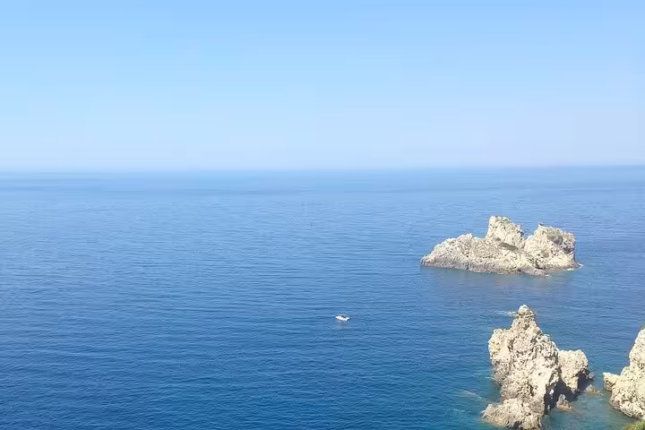 Ionian Sea cliffs and offshore rocks near Corfu, Greece, scenic viewpoint on a Corfu in a Day private tour