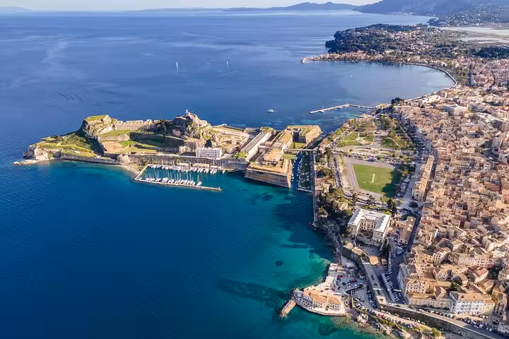 Aerial view of Corfu Old Fortress and Old Town coastline, highlight of Corfu in a Day private tour