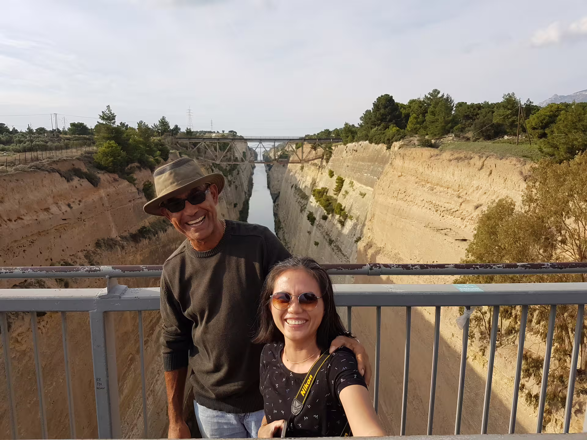 Selfie on the Corinth Canal bridge during a private Athens day tour to Isthmus Canal, Ancient Corinth and Mycenae