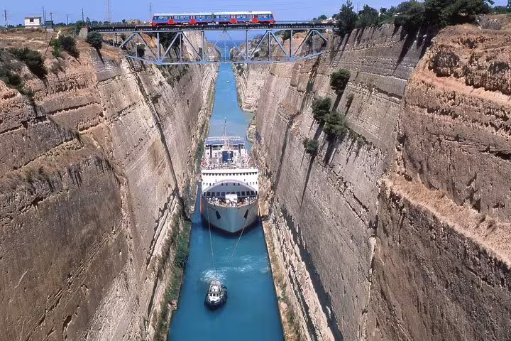 Experience a ship navigating the iconic Corinth Canal, a must-see on the 4-day classical tour from Athens.