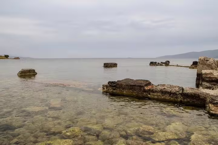 Rocky shoreline on the Corinthian Gulf near Corinth, scenic stop on Athens to Corinth private tour