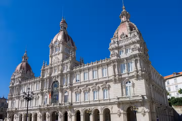 Marvel at the grand architecture of A Coruña's City Hall, a highlight of the Galicia leg of the 14-day tour.