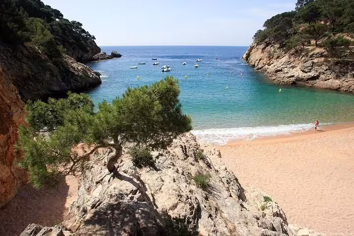 Discover hidden beaches and crystal-clear waters along the scenic Costa Brava coastline.