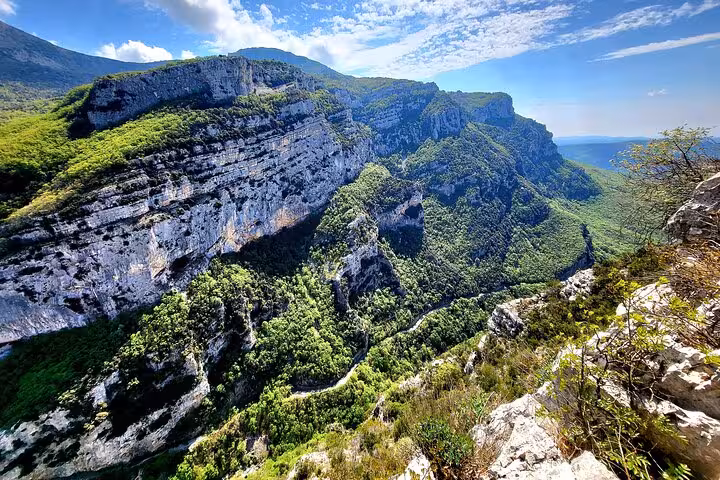 Stunning aerial view of verdant cliffs and valleys in the dramatic landscape of the Côte d'Azur hinterland.
