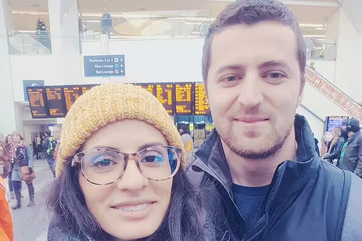 Couple taking a selfie at Birmingham New Street Station during a ghost hunt walking tour