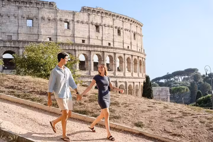Couple strolling near the Colosseum captured by a private personal Rome travel photographer during 3-hour shoot