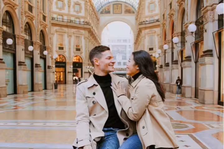 Couple posing in Galleria Vittorio Emanuele II during a private Milan travel photographer tour for romantic photos