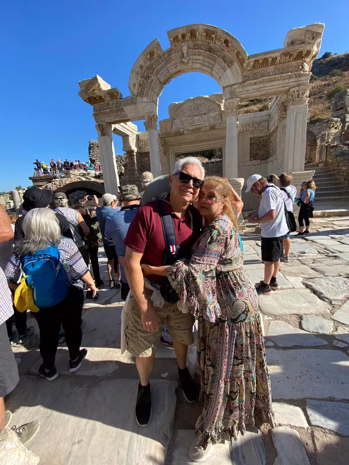 Couple at the Gate of Augustus in ancient Ephesus on a small-group guided tour, part of Ephesus and Istanbul package