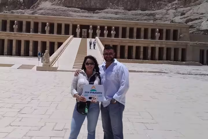 Couple at Hatshepsut Temple during private overnight Luxor tour from Cairo by flight with Egypt guide