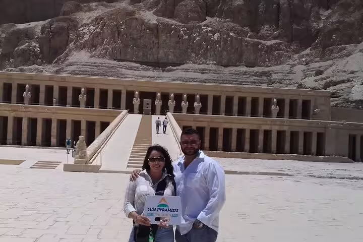 Couple in front of Hatshepsut Temple, Deir el-Bahari, on Luxor West Bank tour with Valley of the Kings