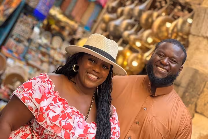 Happy couple at Khan El Khalili Bazaar, Cairo, during private Giza Pyramids and Egyptian Museum day tour