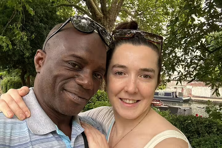Couple smiling by Little Venice London canal waterway on a sunny day