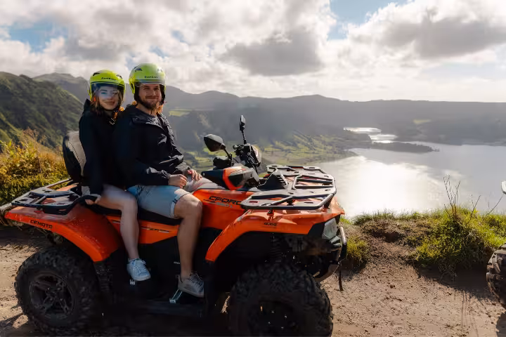 Couple on quad bike at Sete Cidades viewpoint overlooking lagoon on Full Day Quad Tour with lunch, Azores