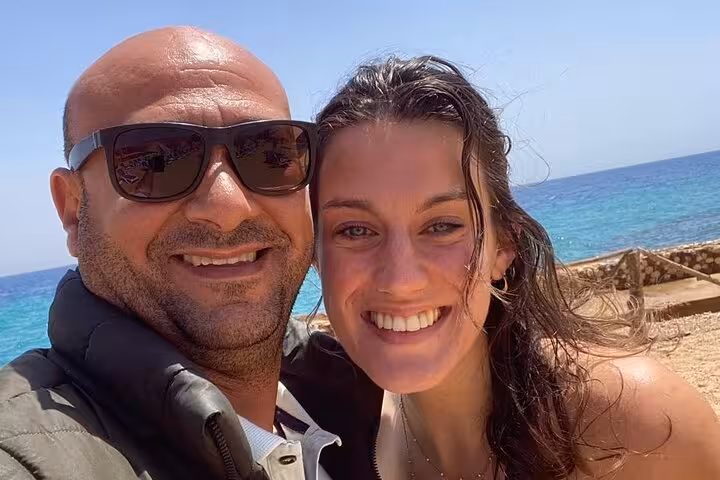 Happy couple selfie by the Red Sea on a day tour to Ain El Sokhna from Cairo, Egypt beach getaway
