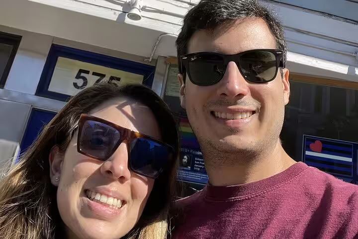 Couple smiling on San Francisco self-guided walking tour outside building number 575