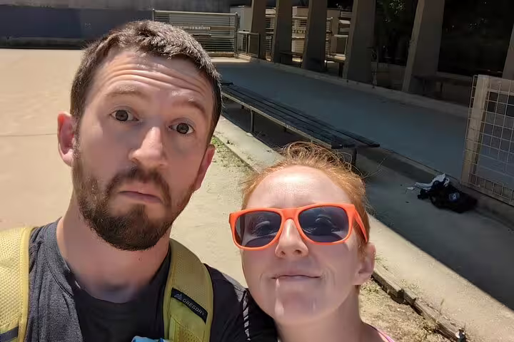Couple taking a selfie outdoors at Hyde Street Pier on San Francisco walking tour