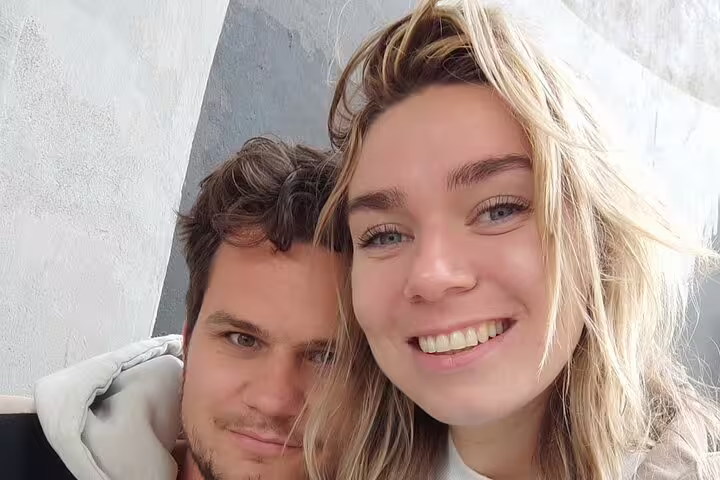 Couple smiling together on Krakow Jewish Quarter walking tour