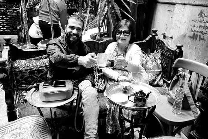 Couple enjoying tea at Khan El Khalili bazaar cafe, part of a private Cairo day tour experience