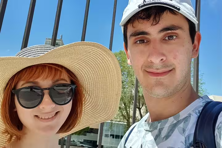 Two smiling tourists on a sunny day in Marseille Old Town guided walking tour