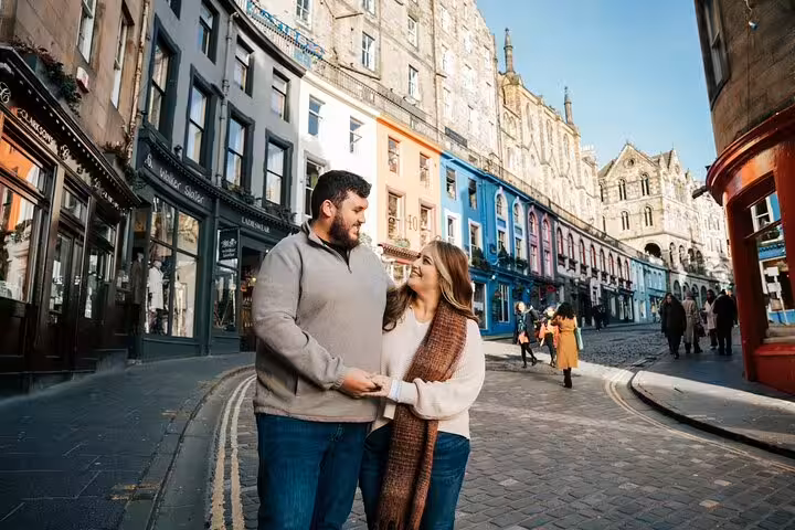 Couple photo session on Victoria Street, Edinburgh with a professional photographer on a private photoshoot tour