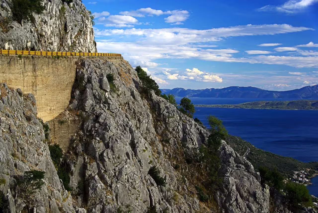 Scenic cliffside coastal road above the Adriatic Sea, an iconic drive on a 15-day Croatia self-drive itinerary