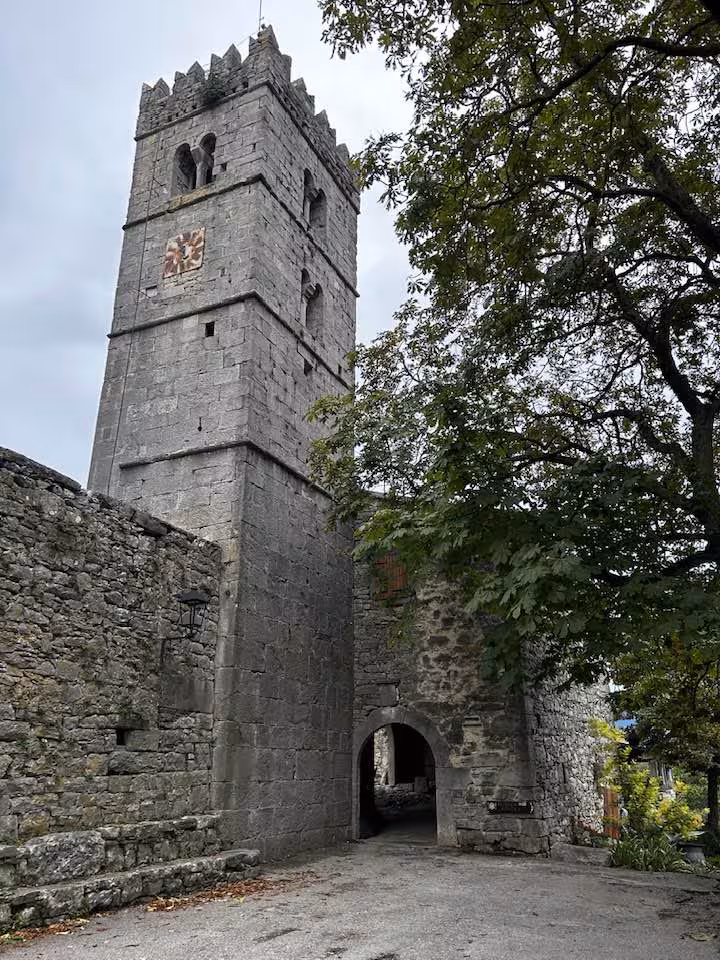 Medieval stone tower with arched gateway and battlements in historic Croatia