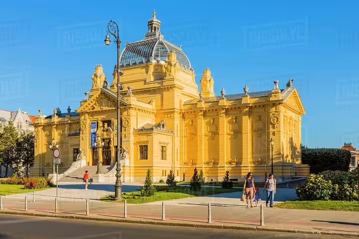 Croatian National Theatre in Zagreb, grand yellow landmark featured on guided Zagreb city tour walk
