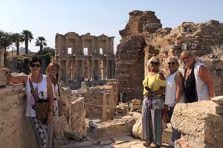 Cruise guests pose by the Library of Celsus in Ephesus on a private skip-the-line shore excursion