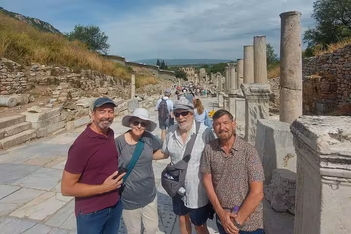 Cruise passengers with guide on Curetes Street in Ephesus, part of private Ephesus and Sirince Village tour