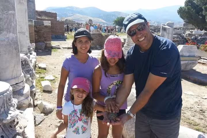 Cruise passengers family with private guide at Ancient Ephesus ruins, Turkey, on a skip-the-line shore tour