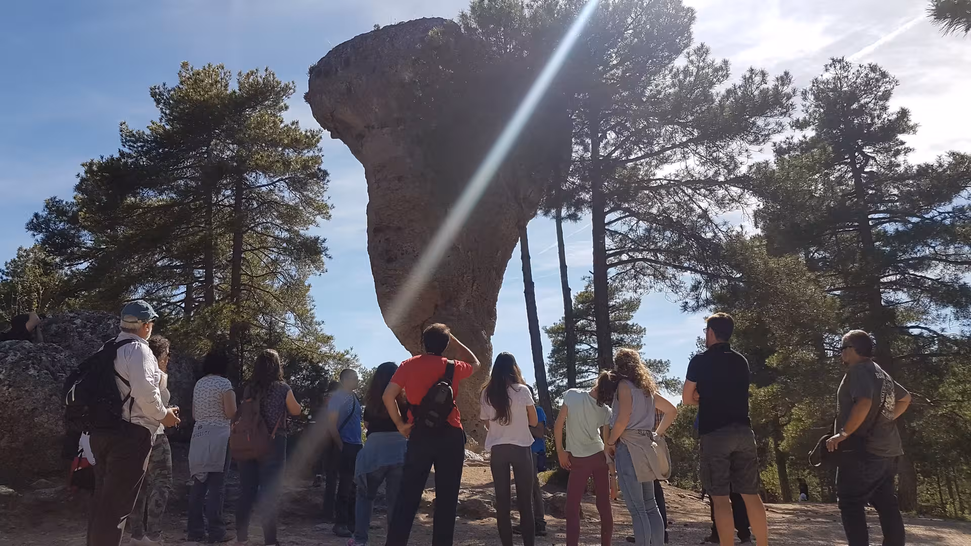Group admiring the Tormo Alto rock formation in Ciudad Encantada on a Cuenca day trip from Madrid